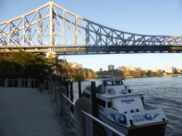 Boat, the Story Bridge over the Brisbane River and the City Reach Boardwalk