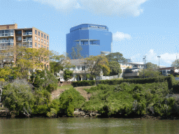 The Toowong Village shopping mall at Coronation Drive and the Brisbane River, viewed from the Miramar Koala & River Cruise boat