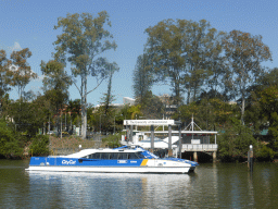 Boat in the Brisbane River and the University of Queensland ferry terminal, viewed from the Miramar Koala & River Cruise boat