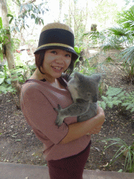 Miaomiao with a Koala during the Koala Cuddling at the Lone Pine Koala Sanctuary