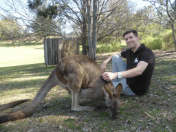 Tim with a Kangaroo at the Lone Pine Koala Sanctuary