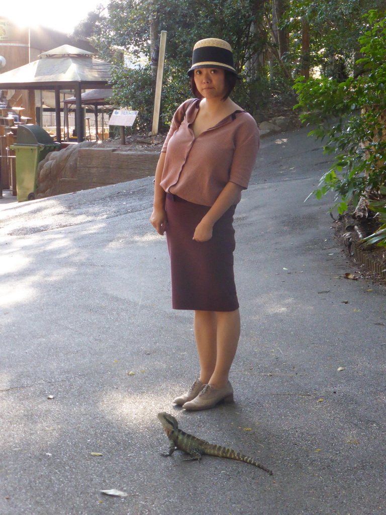 Miaomiao with an Eastern Water Dragon at the Lone Pine Koala Sanctuary