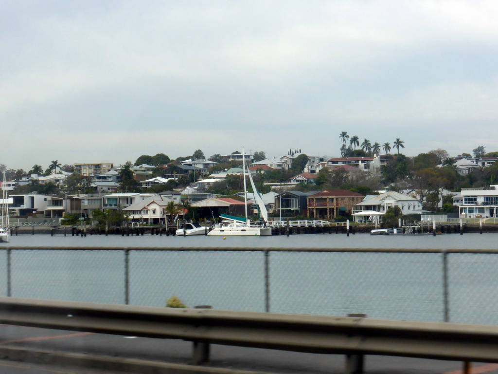 Boats in the Brisbane River at the northeast side of the city, viewed from the taxi to the airport