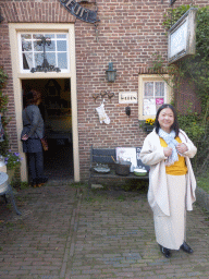 Miaomiao in front of the Dickens Museum at the Onderstraat street