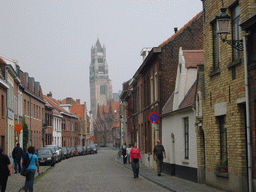 The Oostmeers street and the tower of the St. Salvator`s Cathedral