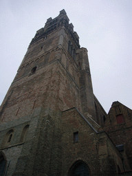 The southwest side of the tower of the St. Salvator`s Cathedral at the Sint-Salvatorskerkhof square