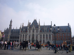 The Markt square with horses and carriages and the front of the Provincial Court
