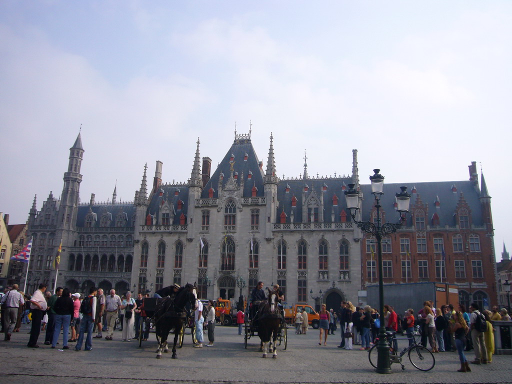 The Markt square with horses and carriages and the front of the Provincial Court