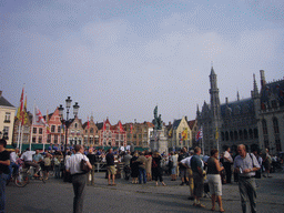 The Markt square with restaurants, the Statue of Jan Breydel and Pieter de Coninck and the left front of the Provincial Court