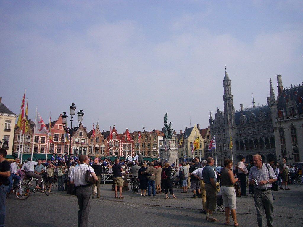 The Markt square with restaurants, the Statue of Jan Breydel and Pieter de Coninck and the left front of the Provincial Court