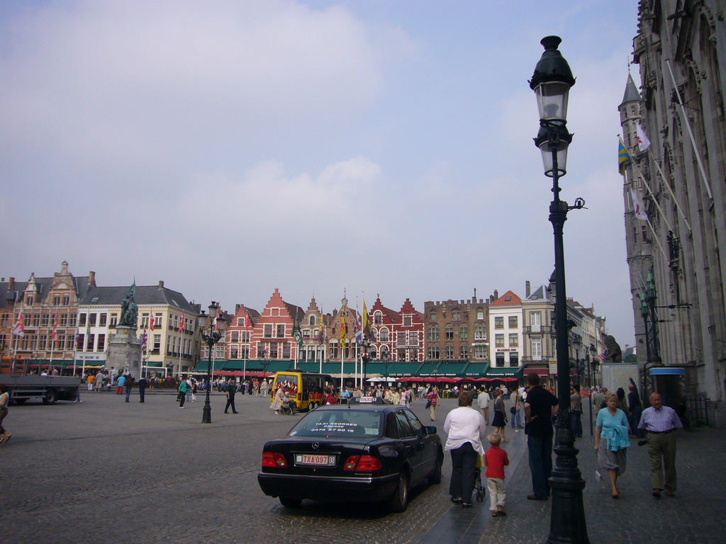 The Markt square with restaurants and the Statue of Jan Breydel and Pieter de Coninck