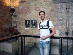 Tim with a bell on the second floor of the Belfort tower