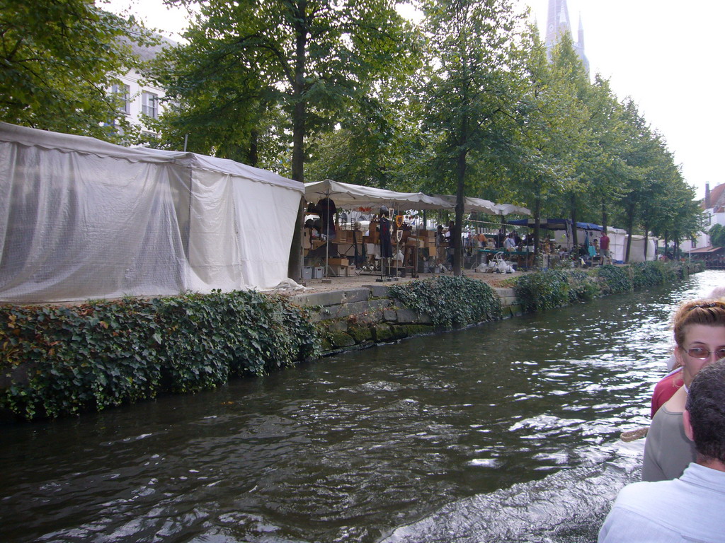 Market stalls at the Dijver park, viewed from the tour boat on the Dijver canal