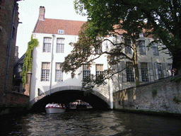 The Arentshuis building and boats on the Bakkersrei canal, viewed from the tour boat