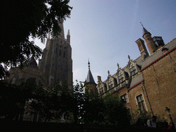 East side and tower of the Church of Our Lady, and the south side of the Gruuthusemuseum, viewed from the tour boat on the Bakkersrei canal