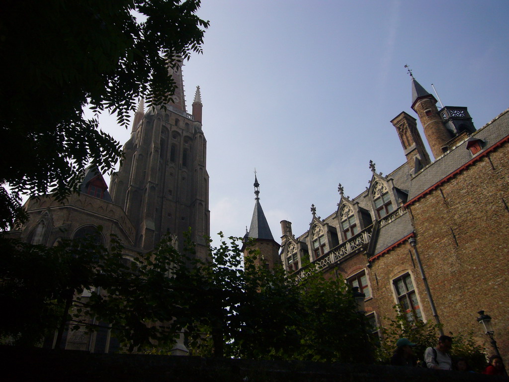 East side and tower of the Church of Our Lady, and the south side of the Gruuthusemuseum, viewed from the tour boat on the Bakkersrei canal