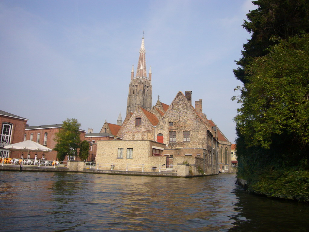 The Bakkersrei canal, the Oud Sint-Janshospitaal museum and the Church of Our Lady, viewed from the tour boat