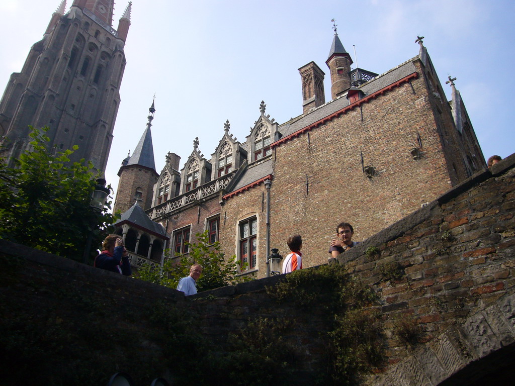 East side and tower of the Church of Our Lady, and the south side of the Gruuthusemuseum, viewed from the tour boat on the Bakkersrei canal