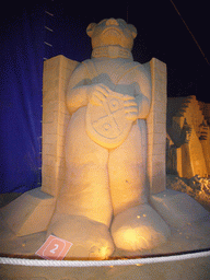 Sand sculpture of a bear with a coat of arms, at the Sand Sculpture Festival at the Stationspark