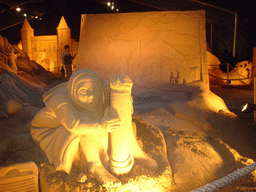 Sand sculptures of a woman, the Gentpoort gate and a relief, at the Sand Sculpture Festival at the Stationspark
