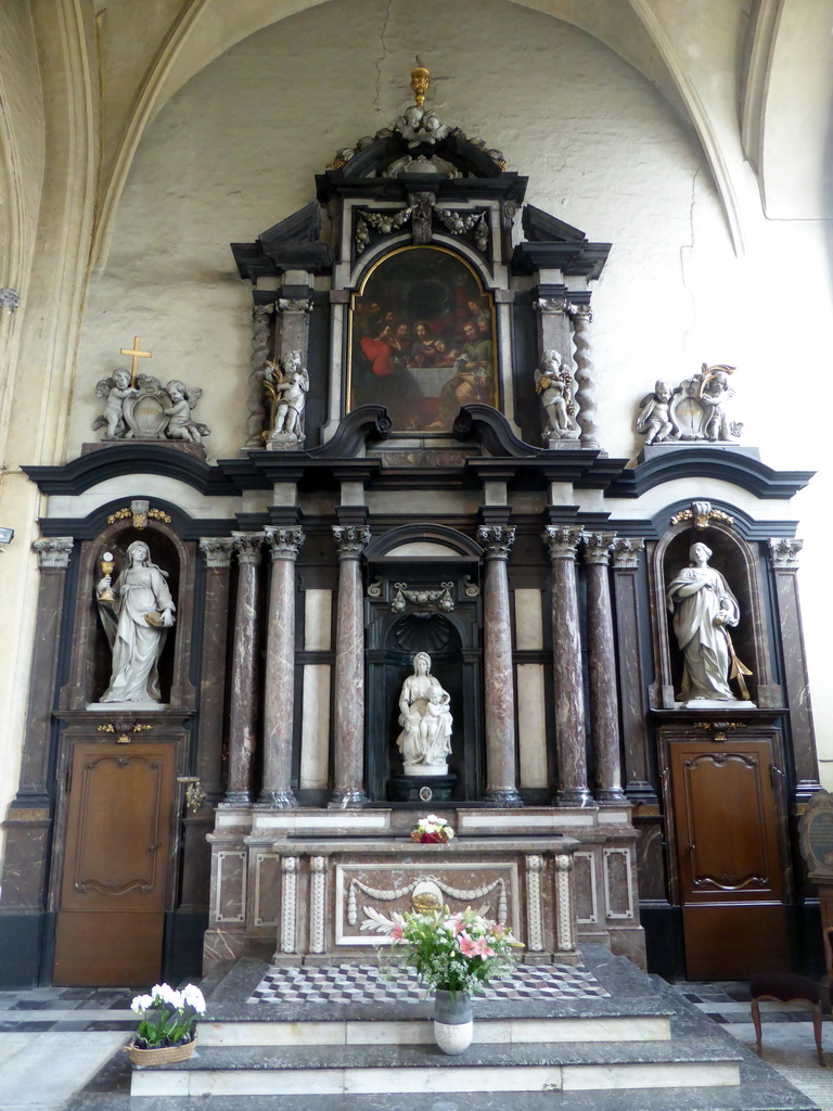 Altar with the sculpture `Madonna and Child` by Michelangelo, at the southeast chapel of the Church of Our Lady