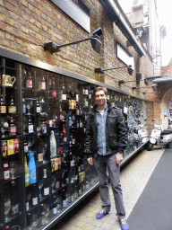 Tim in front of the Beer Wall at the Wollestraat street