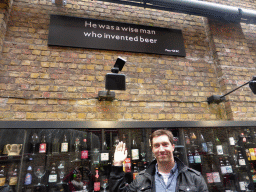 Tim with the quote from Plato above the Beer Wall at the Wollestraat street