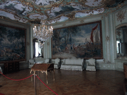 Paintings and furniture in one of the rooms at the upper floor of the Augustusburg Palace