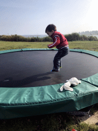 Max on the trampoline at the back side of the Paviljoen Meerzicht restaurant