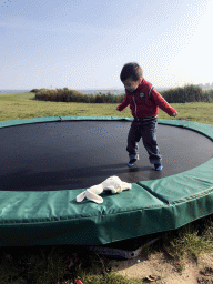 Max on the trampoline at the back side of the Paviljoen Meerzicht restaurant