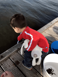 Max catching crabs on a pier at the northwest side of the Grevelingendam