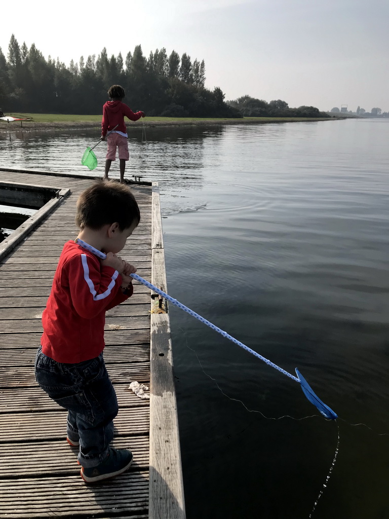 Max catching crabs on a pier at the northwest side of the Grevelingendam