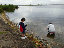 Miaomiao and Max looking for seashells at the northwest side of the Grevelingendam