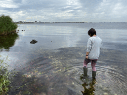 Miaomiao looking for seashells at the northwest side of the Grevelingendam