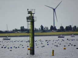 Tower and boats on the Krammer lake, viewed from the southeast side of the Grevelingendam