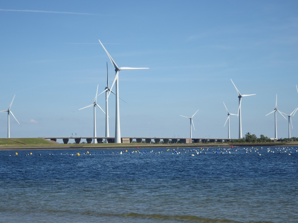 Windmills, the Krammer lake and the Philipsdam, viewed from the beach at the southeast side of the Grevelingendam