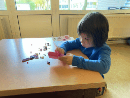 Max playing with Lego in the living room at the ground floor of our apartment at Holiday Park AquaDelta