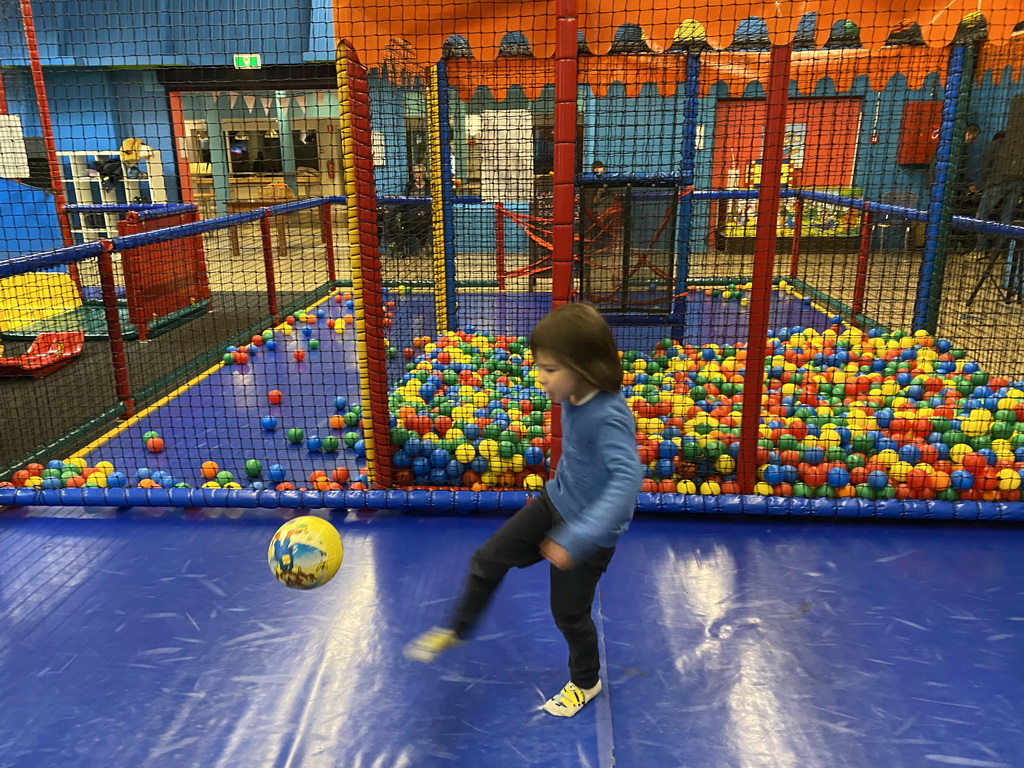 Max playing football at the Kinderland playground at Holiday Park AquaDelta