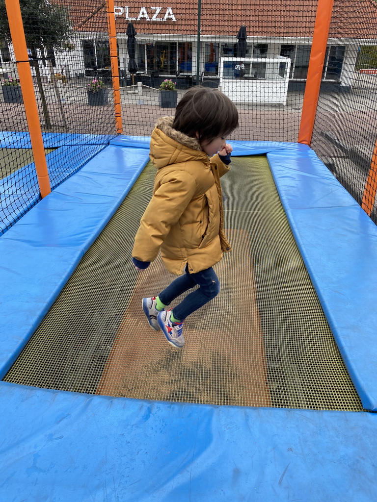 Max on the trampoline at the playground at the central square of Holiday Park AquaDelta