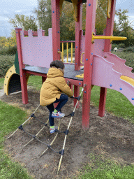 Max at the playground at the minigolf court of Holiday Park AquaDelta