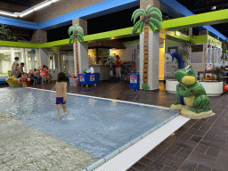 Max at the children`s pool at the swimming pool at Holiday Park AquaDelta