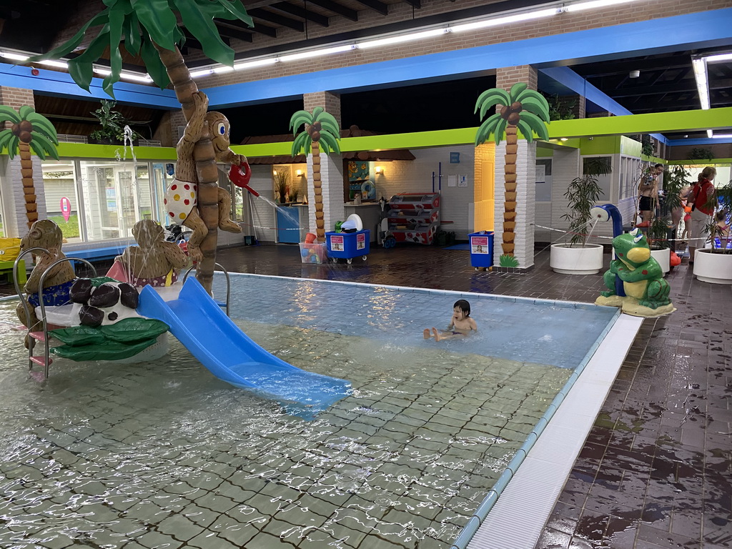 Max at the children`s pool at the swimming pool at Holiday Park AquaDelta