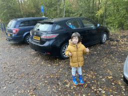 Max in front of our car at the parking lot of Holiday Park AquaDelta