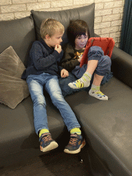 Max and his friend playing with iPad at the living room at the ground floor of our apartment at Holiday Park AquaDelta