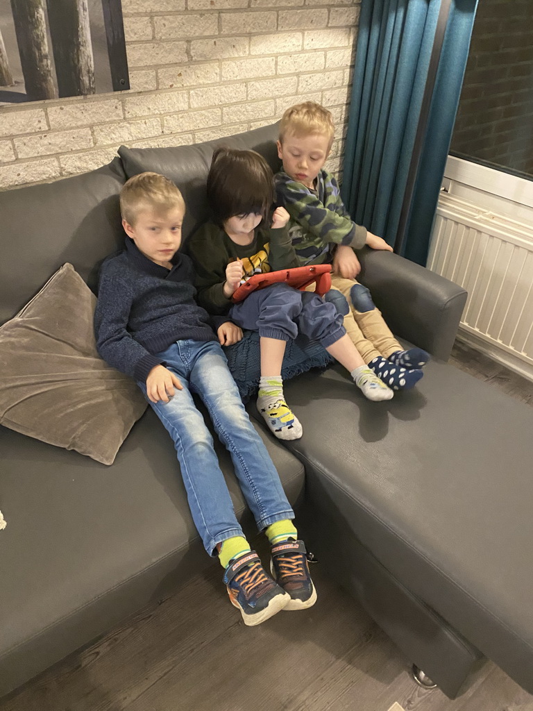 Max and his friends playing with iPad at the living room at the ground floor of our apartment at Holiday Park AquaDelta