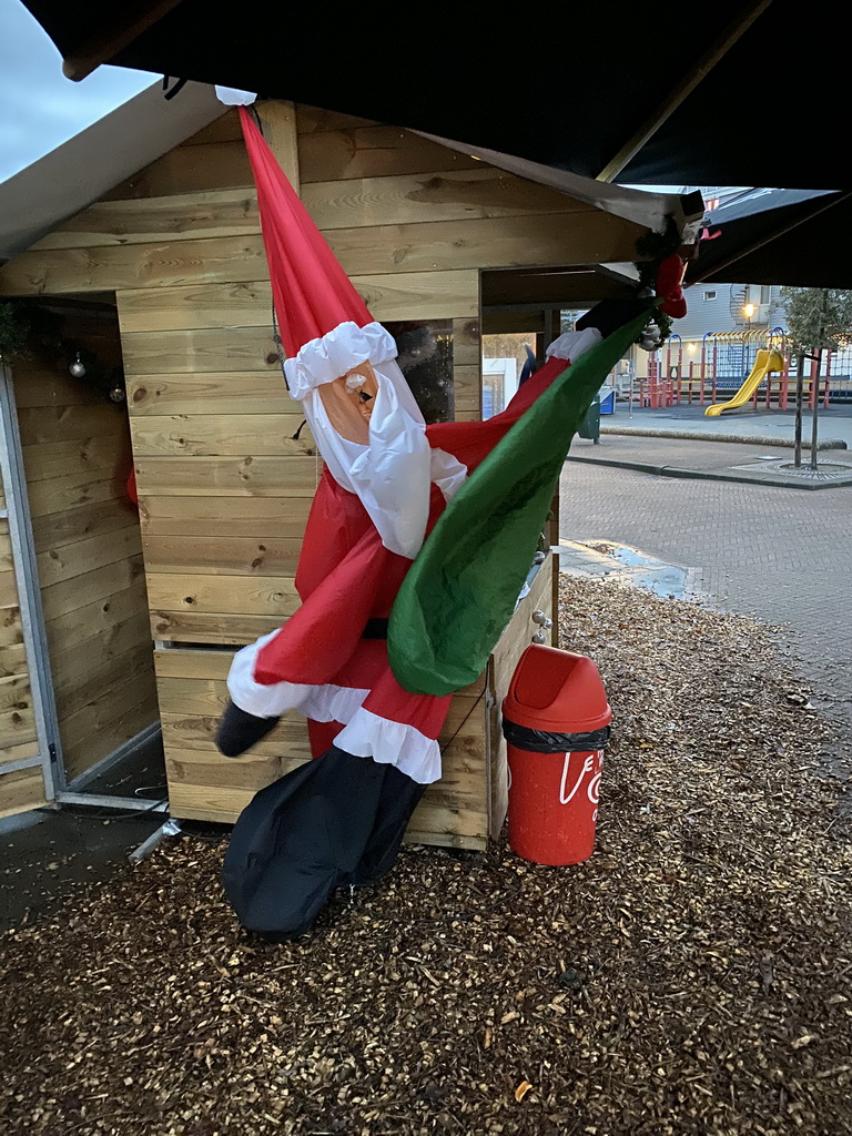 Santa Claus statue at the central square of Holiday Park AquaDelta, at sunrise