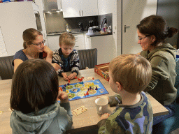 Max and our friends playing Kolonisten van Catan at the living room at the ground floor of our apartment at Holiday Park AquaDelta