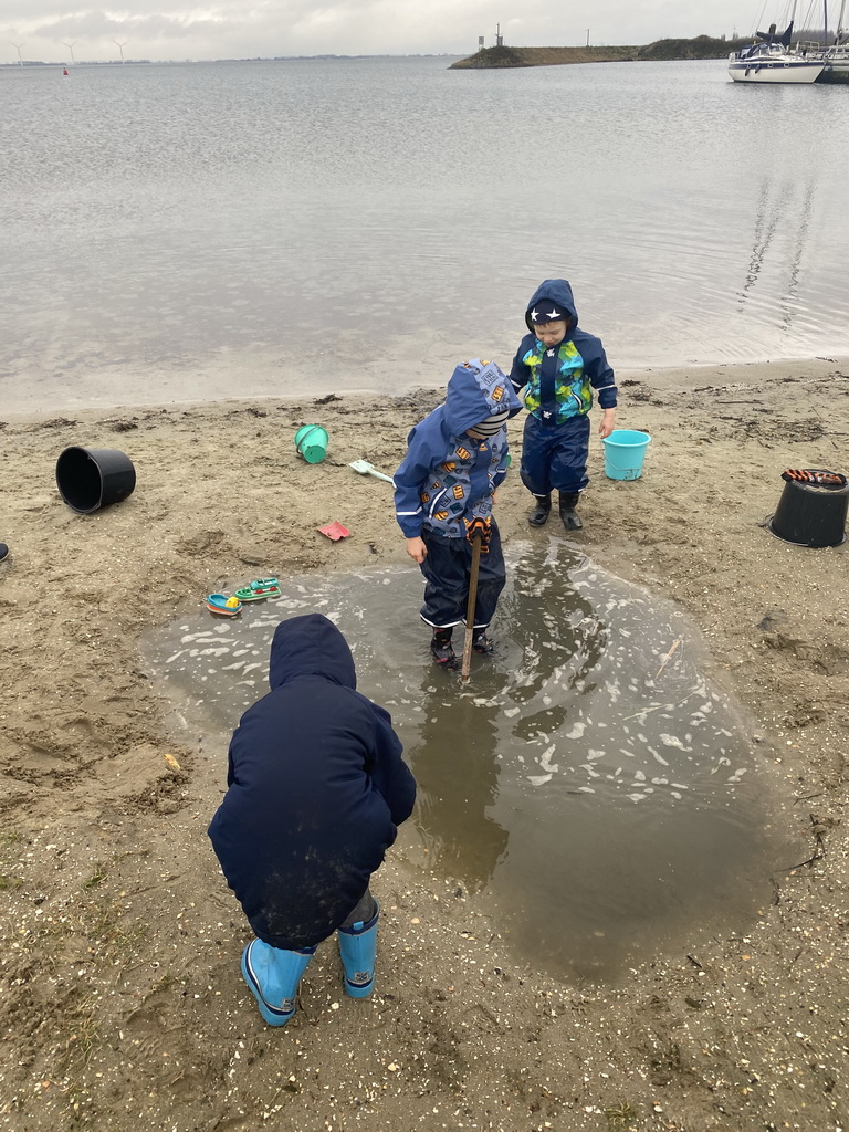 Max and his friends making a sand castle at the Werkhaven beach