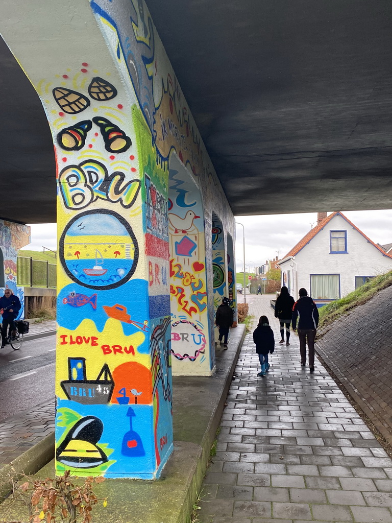 Miaomiao, Max and our friends with graffiti at the tunnel at the Noorddijk street