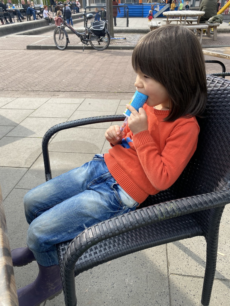 Max having an ice cream on the terrace of the De Branding restaurant at Holiday Park AquaDelta